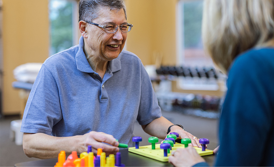 occupational therapy patient working with therapist