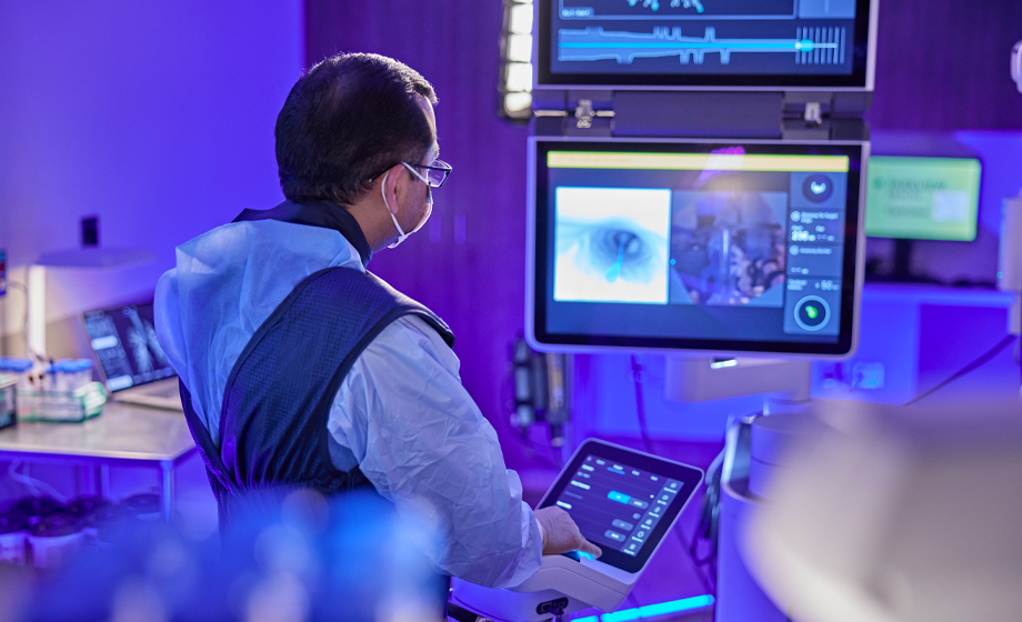Physician looking at computer screen